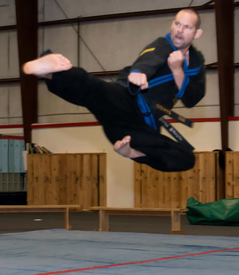 Master Scott Bainton demonstrating advanced martial arts technique at Central Texas Martial Arts in Waco